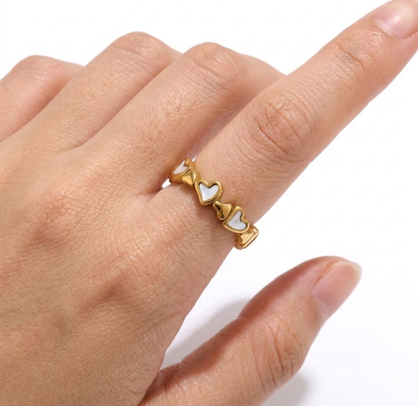 611fc05e3c4ce80992caae23_hearts-of-shell-gold-ring_1777393572708.png