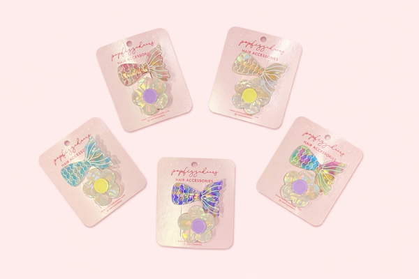 611fc05e3c4ce80992caae23_iridescent-hair-accessories-display_1771224190385.png