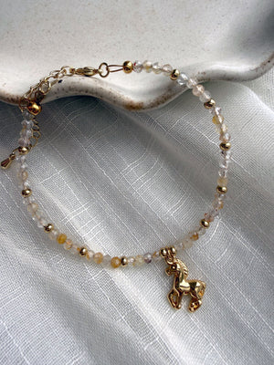 611fc05e3c4ce80992caae23_year-of-the-horse-bracelet-topaz-01_1771023001635.jpg