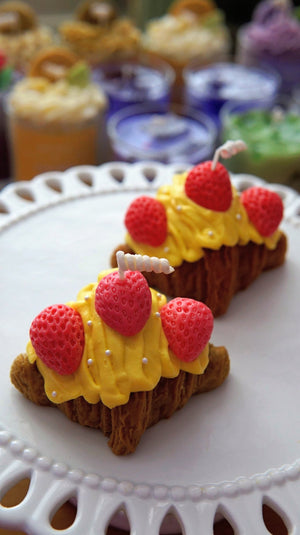 611fc05e3c4ce80992caae23_yellow-croissant-candle_1783730135612.jpg