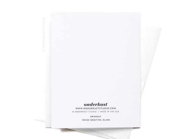 The Youre a Sprinkle Donut greeting card by Onderkast Studio sits on a matching envelope. Its back features black printed text with the Onderkast Studio name and website centered at the bottom for a premium touch.
